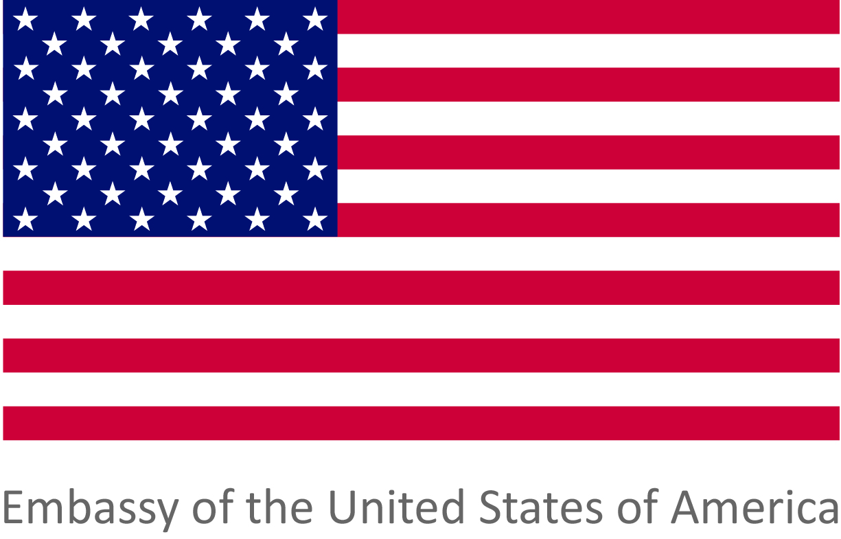Flaga Stanów Zjednoczonych z podpisem Embassy of the United States of America