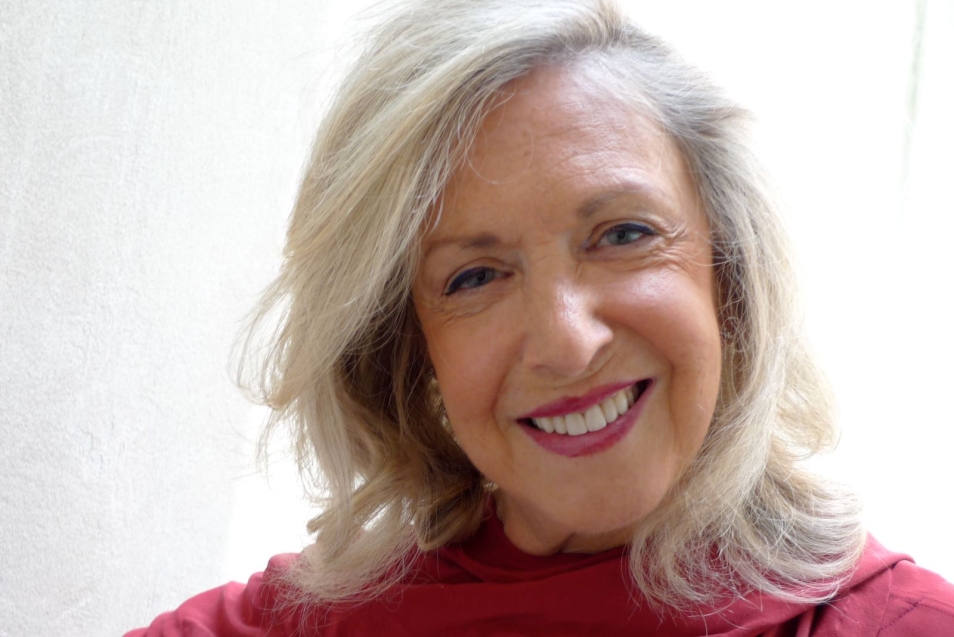 Irene Pletka. Blonde woman smiling.