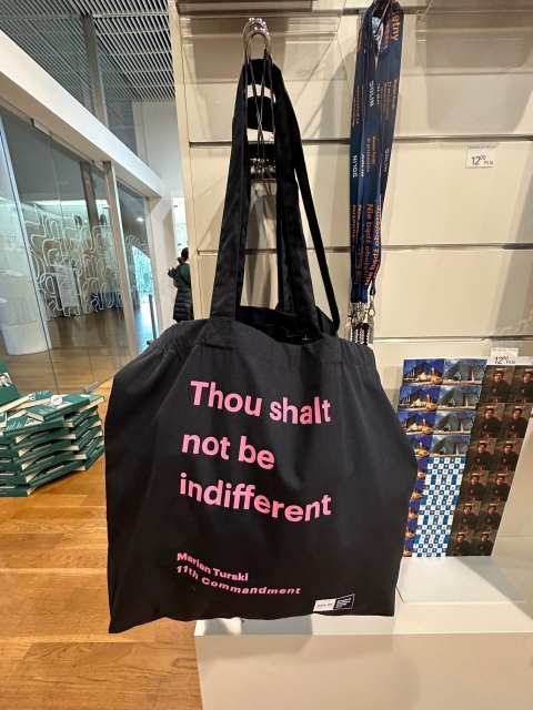 Thou shalt not be indifferent bag in the museum store.