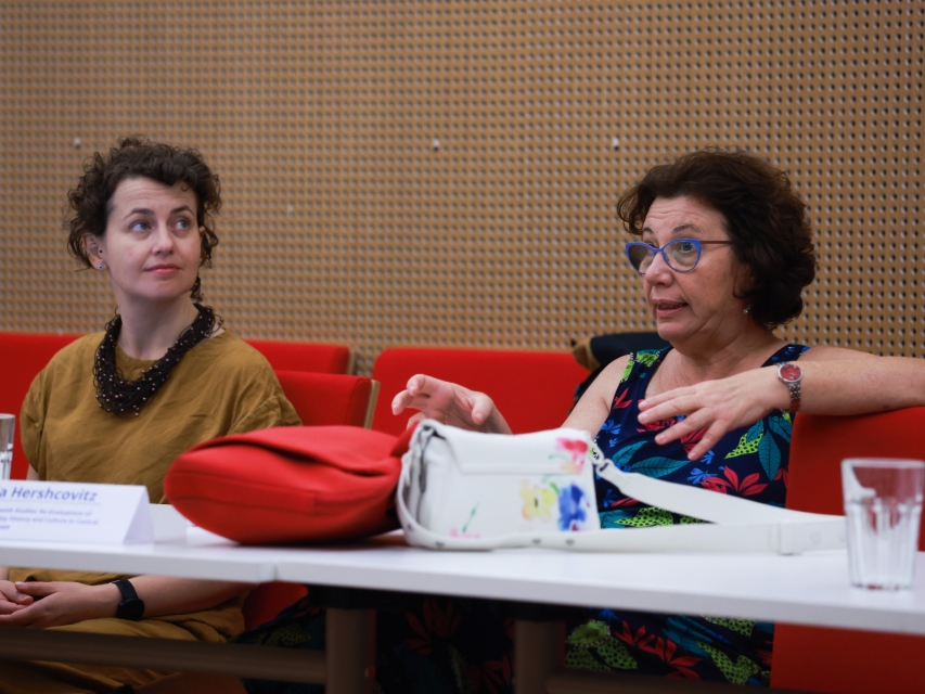 Two women sitting next to each other during 2024 GEOP workshop.