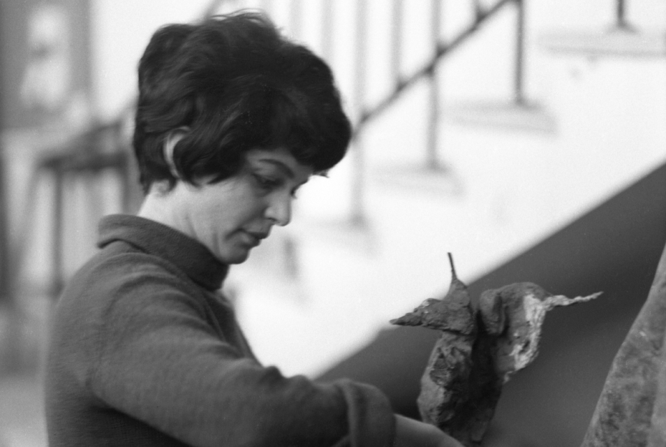 Alina Szapocznikow stands near one of her sculptures